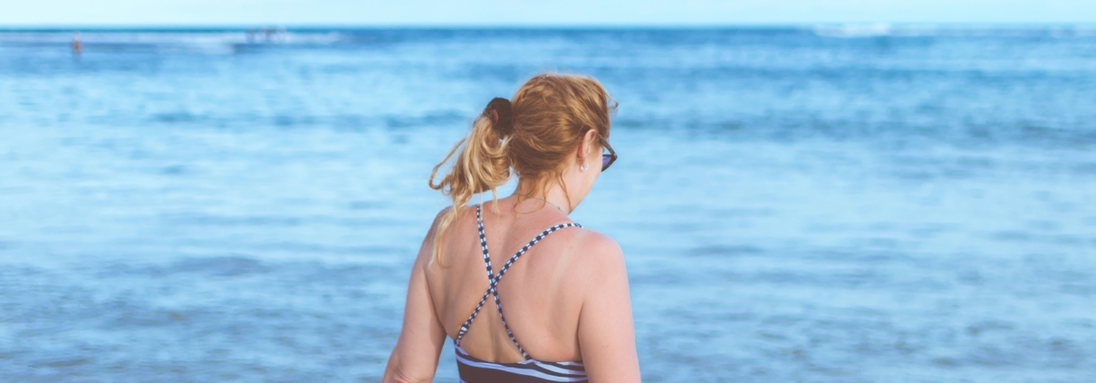https://unsplash.com/photos/woman-standing-on-seashore-dcv1MNo6xRo